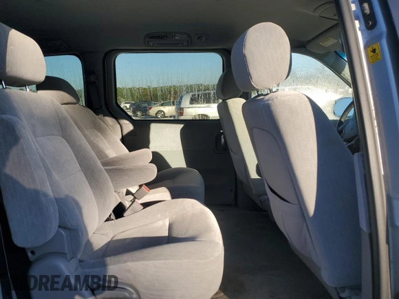 2004 Kia Sedona LX with VIN KNDUP131346508490, listed as a Copart auction lot 77391594 with 41,211 mi miles and Salvage Title. Bid and sale history available at carsss.com. Image 11.
