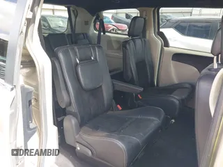 2014 Dodge Grand Caravan SXT with VIN 2C4RDGCG6ER466459, listed as a IAAI auction lot 41820907 with 105,404 mi miles and . Bid and sale history available at DreamBid. Image 8.