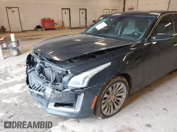 2014 Cadillac CTS Luxury AWD with VIN 1G6AX5SX2E0195357, listed as a IAAI auction lot 41677831 with 152,567 mi miles and . Bid and sale history available at DreamBid. Image 6.
