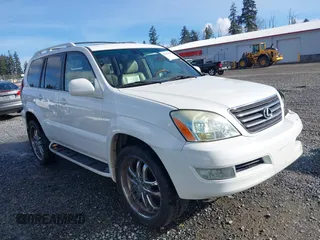 2003 Lexus GX 470 with VIN JTJBT20X330021757, listed as a IAAI auction lot 41695930 with 177,634 mi miles. Bid and sale history available at carsss.com. Image 1.