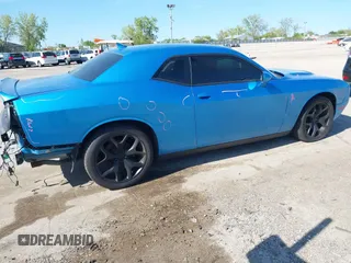 2015 Dodge Challenger SXT Plus with VIN 2C3CDZBG7FH901178, listed as a IAAI auction lot 42220878 with 123,146 mi miles and . Bid and sale history available at DreamBid. Image 4.