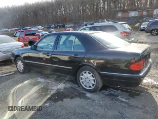 1996 Mercedes-Benz E-Class with VIN WDBJF55F9TJ006471, listed as a Copart auction lot 84835264 with 0 mi miles and Salvage Title. Bid and sale history available at carsss.com. Image 2.