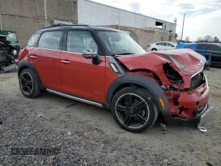 2016 MINI Countryman S with VIN WMWZC5C51GWU01015, listed as a Copart auction lot 51223155 with 74,602 mi miles and Salvage Title. Bid and sale history available at DreamBid. Image 4.