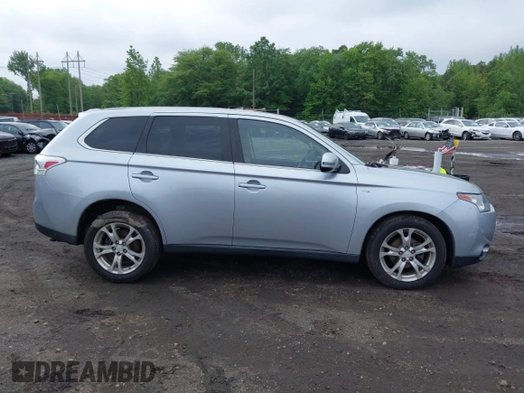 2014 Mitsubishi Outlander GT with VIN JA4JZ4AX3EZ013934, listed as a IAAI auction lot 42382774 with 66,829 mi miles and . Bid and sale history available at DreamBid. Image 13.