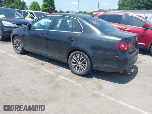 2009 Volkswagen Jetta SE with VIN 3VWRM71K79M166916, listed as a IAAI auction lot 42400659 with 166,061 mi miles and . Bid and sale history available at DreamBid. Image 3.