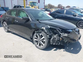 2016 Nissan Altima S z VIN 1N4AL3AP9GC175452, wystawiony jako IAAI lot #41979938 z przebiegiem 145 950 mil mil oraz . Historia ofert i sprzedaży dostępna na DreamBid. Obrazek 1.