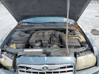 2005 Chrysler 300 Touring z VIN 2C3JA53G95H546536, wystawiony jako Copart lot #60667575 z przebiegiem 163 625 mil mil oraz Szkoda całkowita • Salvage title. Historia ofert i sprzedaży dostępna na DreamBid. Obrazek 11.