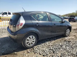 2014 Toyota Prius c One with VIN JTDKDTB39E1562504, listed as a Copart auction lot 52150365 with 195,052 mi miles and Salvage Title. Bid and sale history available at carsss.com. Image 3.