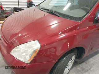 2010 Kia Sedona LX with VIN KNDMG4C35A6343380, listed as a IAAI auction lot 42042669 with 119,648 mi miles. Bid and sale history available at carsss.com. Image 13.