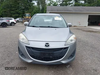 2014 Mazda 5 Sport z VIN JM1CW2BL5E0172594, wystawiony jako IAAI lot #42628707 z przebiegiem 180 369 mil mil oraz . Historia ofert i sprzedaży dostępna na DreamBid. Obrazek 13.