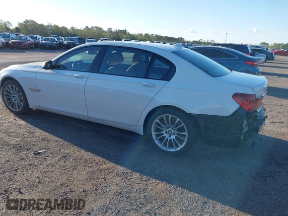 2014 BMW 7 Series ALPINA B7 with VIN WBAYE8C59ED134562, listed as a IAAI auction lot 41806222 with 120,043 mi miles. Bid and sale history available at carsss.com. Image 3.