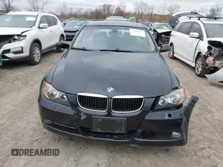 2008 BMW 3 Series 328xi with VIN WBAVC93548KZ73131, listed as a IAAI auction lot 42052857 with 118,077 mi miles. Bid and sale history available at carsss.com. Image 12.
