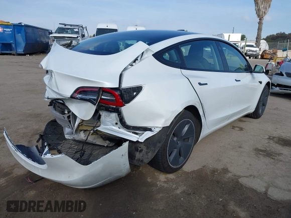 2022 Tesla Model 3 with VIN 5YJ3E1EA1NF167711, listed as a IAAI auction lot 41594266 with 50,554 mi miles and . Bid and sale history available at DreamBid. Image 4.