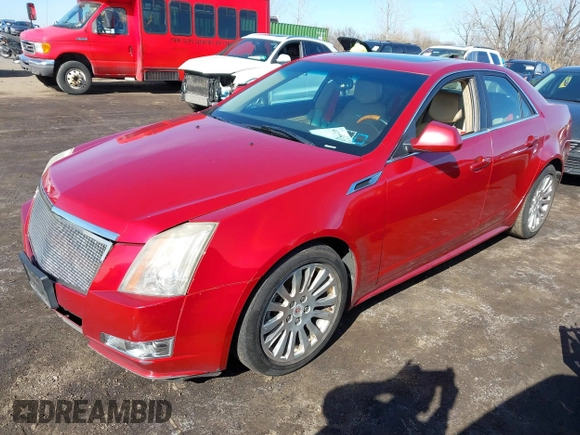 2011 Cadillac CTS Premium with VIN 1G6DS5ED7B0133154, listed as a IAAI auction lot 41822033 with 121,862 mi miles. Bid and sale history available at carsss.com. Image 2.
