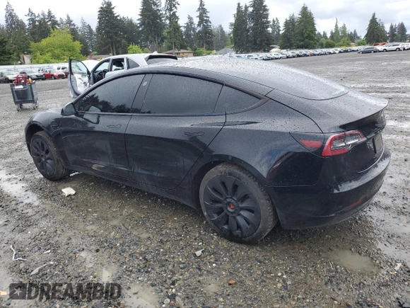 2023 Tesla Model 3 with VIN 5YJ3E1EA2PF457667, listed as a Copart auction lot 57360035 with 53,962 mi miles and Salvage title. Bid and sale history available at DreamBid. Image 2.
