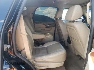 2009 Chevrolet Tahoe LTZ with VIN 1GNFK33039J125428, listed as a Copart auction lot 57962875 with 245,554 mi miles and Salvage title. Bid and sale history available at DreamBid. Image 11.