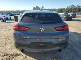 2022 BMW X2 xDrive28i with VIN WBXYJ1C0XN5T67566, listed as a Copart auction lot 86689864 with 42,496 mi miles and Salvage Title. Bid and sale history available at carsss.com. Image 6.
