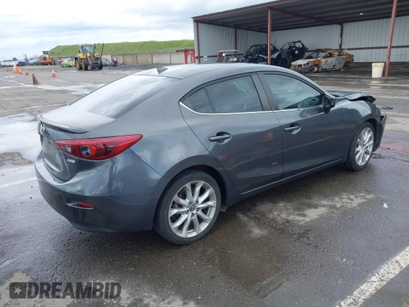 2014 Mazda 3 S Touring with VIN JM1BM1V31E1132448, listed as a IAAI auction lot 41815085 with 144,705 mi miles and . Bid and sale history available at DreamBid. Image 4.