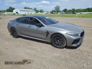 2022 BMW M8 Competition z VIN WBSGV0C08NCH61825, wystawiony jako Copart lot #57515605 z przebiegiem 56 046 mil mil oraz Tytuł czysty. Historia ofert i sprzedaży dostępna na DreamBid. Obrazek 4.