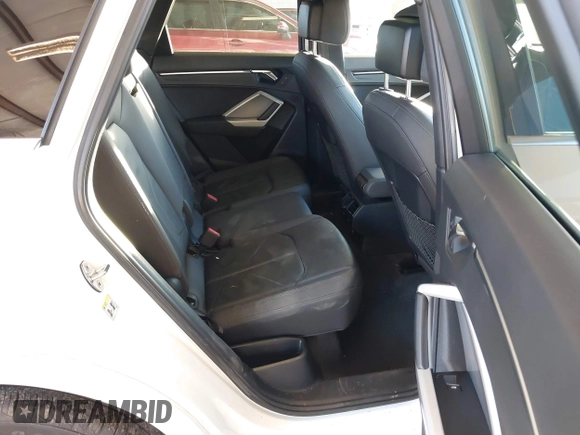 2021 Audi Q3 Premium with VIN WA1AUCF37M1087692, listed as a IAAI auction lot 41277380 with 66,039 mi miles and . Bid and sale history available at DreamBid. Image 8.