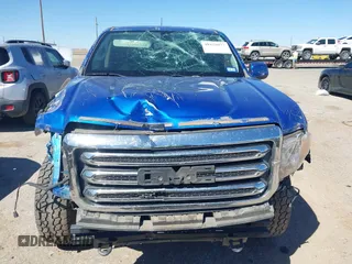 2019 GMC Canyon 4WD SLE z VIN 1GTG6CENXK1222416, wystawiony jako IAAI lot #41878077 z przebiegiem 85 415 mil mil oraz . Historia ofert i sprzedaży dostępna na DreamBid. Obrazek 13.