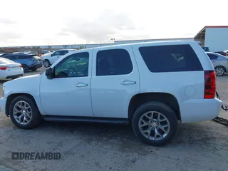 2013 Chevrolet Tahoe Commercial with VIN 1GNLC2E06DR348757, listed as a IAAI auction lot 41711877 with 163,473 mi miles and . Bid and sale history available at DreamBid. Image 14.