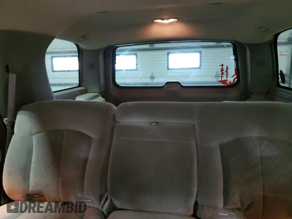 2002 Chevrolet Tahoe Z71 z VIN 1GNEK13Z62R120231, wystawiony jako Copart lot #58536675 z przebiegiem 194 981 mil mil oraz Czysty tytuł • Clean title. Historia ofert i sprzedaży dostępna na DreamBid. Obrazek 10.