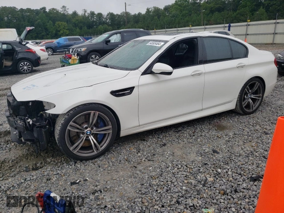 2013 BMW M5 with VIN WBSFV9C59DD096273, listed as a Copart auction lot 64565464 with 122,028 mi miles and Salvage Title. Bid and sale history available at carsss.com. Image 1.