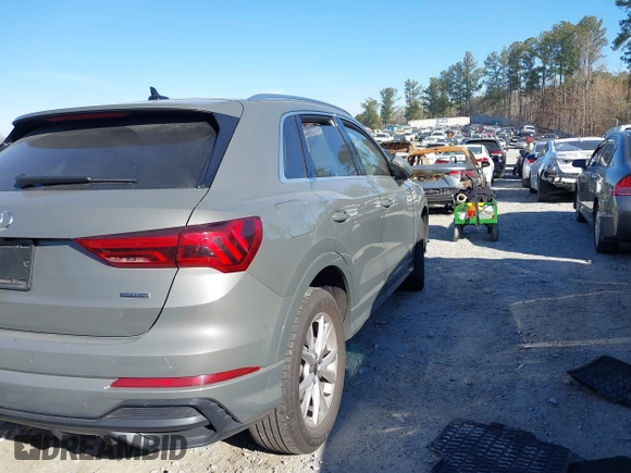 2021 Audi Q3 S line Premium with VIN WA1DECF39M1039802, listed as a IAAI auction lot 41663221 with 50,455 mi miles and . Bid and sale history available at DreamBid. Image 4.