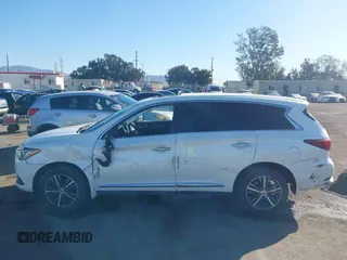 2019 Infiniti QX60 LUXE with VIN 5N1DL0MN9KC515168, listed as a IAAI auction lot 41354634 with 84,173 mi miles. Bid and sale history available at carsss.com. Image 13.