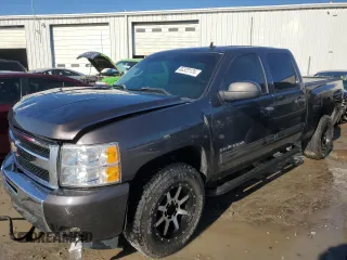 2010 Chevrolet Silverado 1500 LT with VIN 3GCRCSE01AG129980, listed as a Copart auction lot 86322124 with 183,089 mi miles and Salvage Title. Bid and sale history available at DreamBid. Image 1.