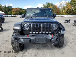 2023 Jeep Wrangler Rubicon with VIN 1C4HJXFN4PW636133, listed as a Copart auction lot 75499614 with 13,252 mi miles and Salvage title. Bid and sale history available at DreamBid. Image 5.
