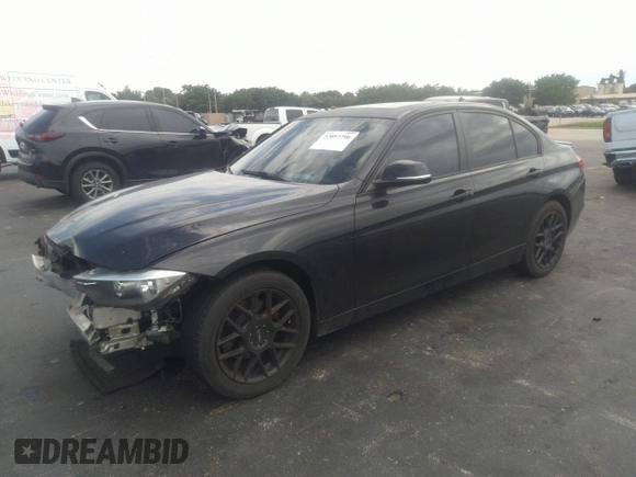 2013 BMW 3 Series 328i with VIN WBA3A5G55DNP26709, listed as a IAAI auction lot 37057796 with 103,168 mi miles and . Bid and sale history available at DreamBid. Image 2.
