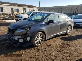 2010 Lexus HS 250h with VIN JTHBB1BA6A2020658, listed as a Copart auction lot 89001325 with 164,075 mi miles and Salvage Title. Bid and sale history available at DreamBid. Image 1.