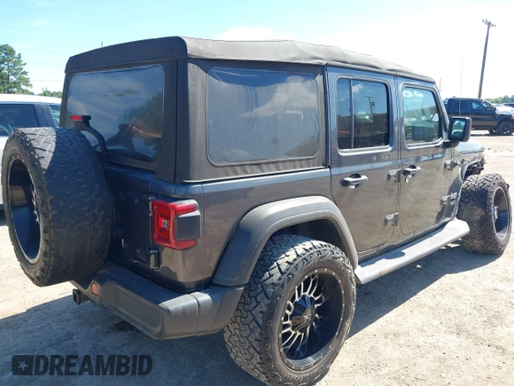 2018 Jeep Wrangler Unlimited Sport S с VIN 1C4HJXDN6JW277829, выставлен на аукционе IAAI как лот 42607187 с пробегом 107 461 миль миль и . История ставок и продаж доступна на DreamBid. Изображение 4.