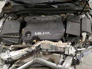 2015 Chevrolet Impala LTZ with VIN 1G1165S38FU137737, listed as a Copart auction lot 52447995 with 104,999 mi miles and Salvage Title. Bid and sale history available at DreamBid. Image 11.