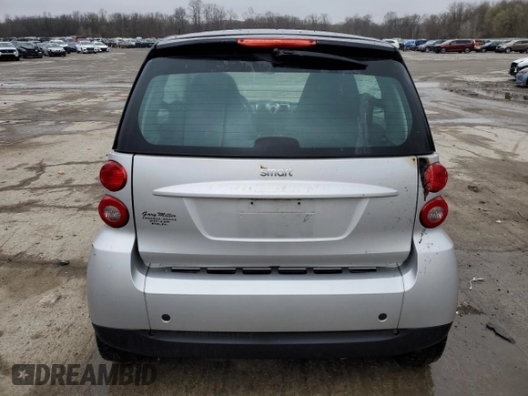 2008 Smart fortwo Pure z VIN WMEEJ31X58K178519, wystawiony jako Copart lot #52978925 z przebiegiem 50 975 mil mil oraz Szkody całkowita. Historia ofert i sprzedaży dostępna na DreamBid. Obrazek 6.