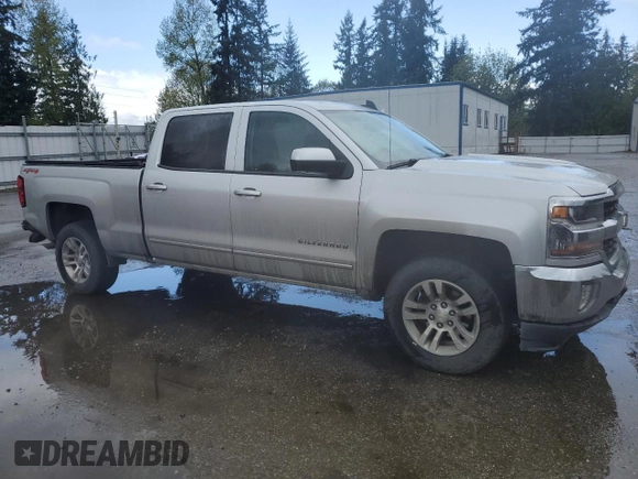 2016 Chevrolet Silverado 1500 LT with VIN 3GCUKREC6GG127747, listed as a Copart auction lot 53934905 with 228,996 mi miles and Salvage Title. Bid and sale history available at DreamBid. Image 4.