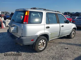 1997 Honda CR-V with VIN JHLRD184XVC014120, listed as a IAAI auction lot 41684375 with 144,915 mi miles. Bid and sale history available at carsss.com. Image 4.