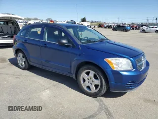 2009 Dodge Caliber SXT with VIN 1B3HB48A99D157051, listed as a Copart auction lot 52098965 with 188,268 mi miles and Salvage Title. Bid and sale history available at carsss.com. Image 4.