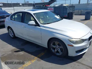 2013 BMW 3 Series 328i with VIN WBA3A5C51DF352812, listed as a IAAI auction lot 41974158 with 176,951 mi miles. Bid and sale history available at carsss.com. Image 1.