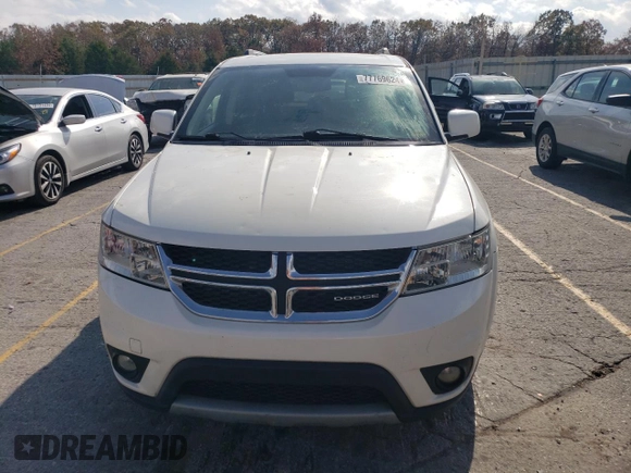 2012 Dodge Journey SXT с VIN 3C4PDCCG7CT211927, выставлен на аукционе Copart как лот 77769624 с пробегом 136 819 миль миль и Списание • Salvage title. История ставок и продаж доступна на DreamBid. Изображение 5.