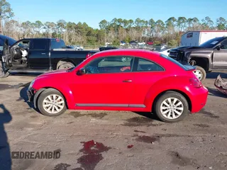 2017 Volkswagen Beetle 1.8T Fleet with VIN 3VWF17AT8HM609304, listed as a IAAI auction lot 41239011 with 68,318 mi miles. Bid and sale history available at carsss.com. Image 14.
