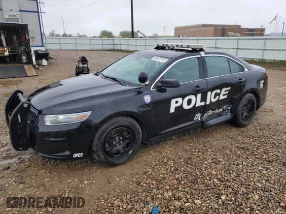 2014 Ford Police Interceptor with VIN 1FAHP2MT9EG111729, listed as a Copart auction lot 56947315 with 74,887 mi miles and Salvage title. Bid and sale history available at DreamBid. Image 1.