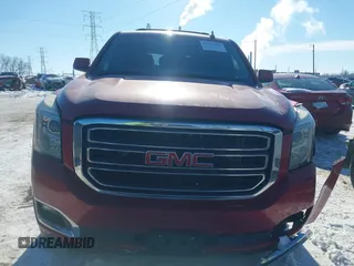 2015 GMC Yukon SLE with VIN 1GKS2AKC2FR514005, listed as a IAAI auction lot 41292783 with 129,413 mi miles. Bid and sale history available at carsss.com. Image 12.