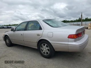 2000 Toyota Camry CE with VIN 4T1BG22K1YU621861, listed as a Copart auction lot 51611275 with 153,153 mi miles and Salvage Title. Bid and sale history available at carsss.com. Image 2.