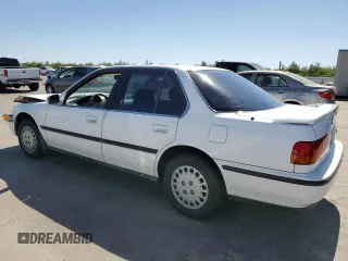 1993 Honda Accord with VIN 1HGCB7653PA144604, listed as a Copart auction lot 60893475 with 149,170 mi miles and Salvage title. Bid and sale history available at DreamBid. Image 2.