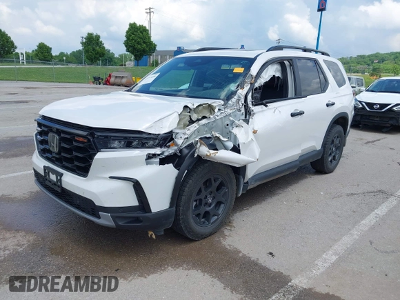2024 Honda Pilot TrailSport z VIN 5FNYG1H6XRB004763, wystawiony jako IAAI lot #42237606 z przebiegiem 14 819 mil mil oraz . Historia ofert i sprzedaży dostępna na DreamBid. Obrazek 18.