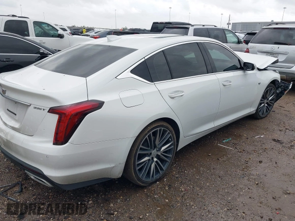 2023 Cadillac CT5 Premium Luxury z VIN 1G6DN5RKXP0123435, wystawiony jako IAAI lot #41565443 z przebiegiem 31 263 mil mil oraz . Historia ofert i sprzedaży dostępna na DreamBid. Obrazek 4.