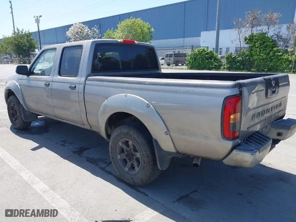 2004 Nissan Frontier 2WD XE with VIN 1N6ED29X84C432617, listed as a IAAI auction lot 42007334 with 289,554 mi miles. Bid and sale history available at carsss.com. Image 3.